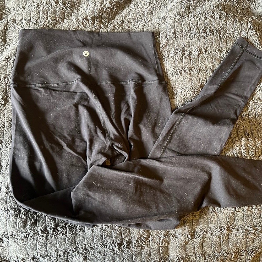Size 6 Lululemon black high waisted leggings. Well loved.